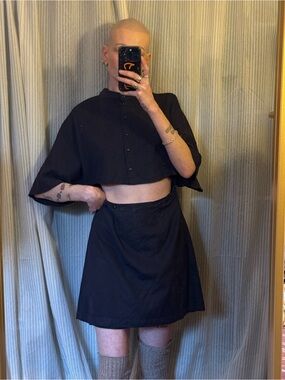 Faded Black A-Line dress with mid drift exposure detail, wrap skirt bottom.